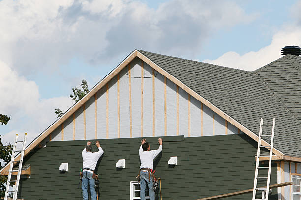 Professional Siding Replacement technician working in Huntingdon Valley, PA